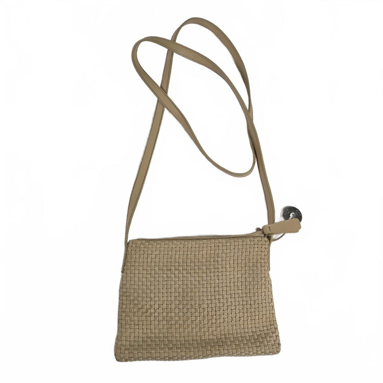 A woven straw crossbody bag with a single adjustable shoulder strap and a small silver metal accent on the side, shown against a plain white background.